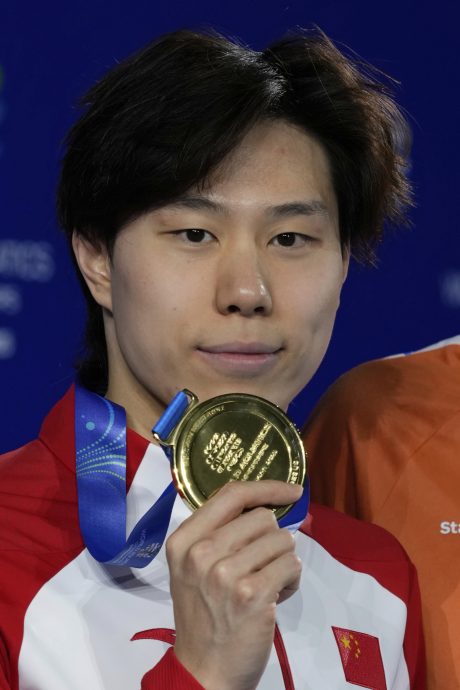 新加坡世界水上运动锦标赛|为中国达3连霸 覃海洋重夺男200米蛙泳世冠