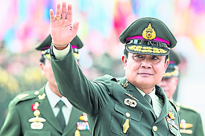 泰国掀争相战 在野党促4个月内大选