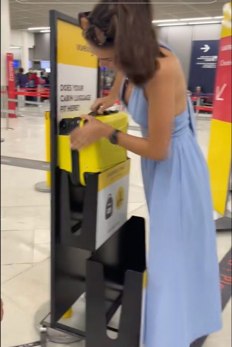  测量框有猫腻？女子硬挤随身行李箱 省992令吉