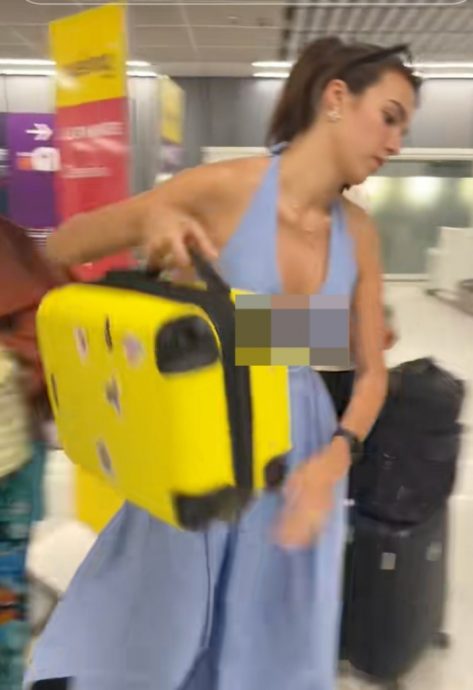  测量框有猫腻？女子硬挤随身行李箱 省992令吉