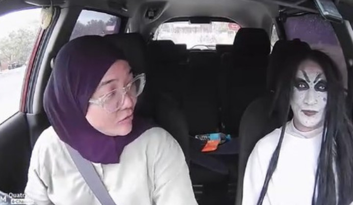  电召车女司机大胆载“女鬼”