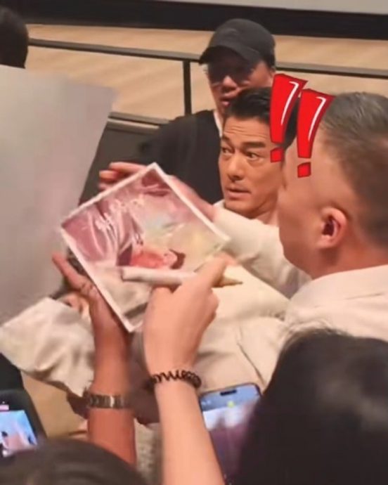 郭富城签名险被粉丝笔戳眼 1举动展现天王风范