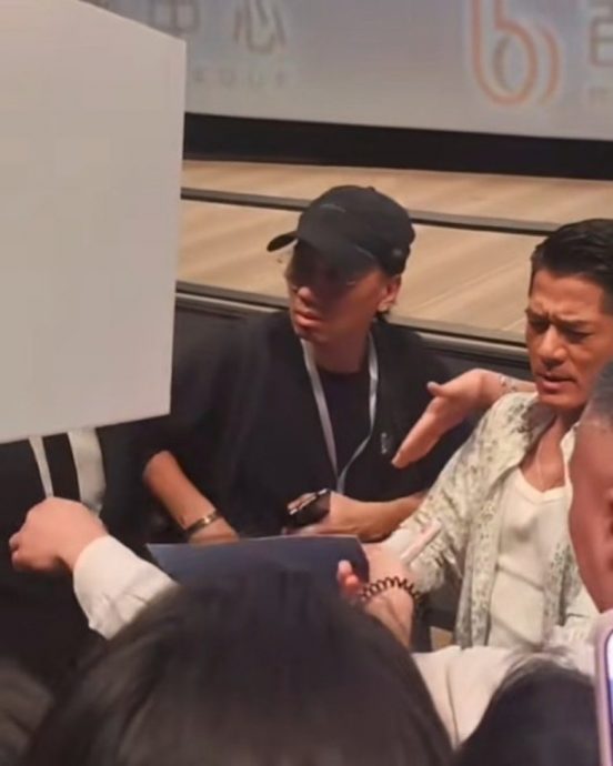 郭富城签名险被粉丝笔戳眼 1举动展现天王风范