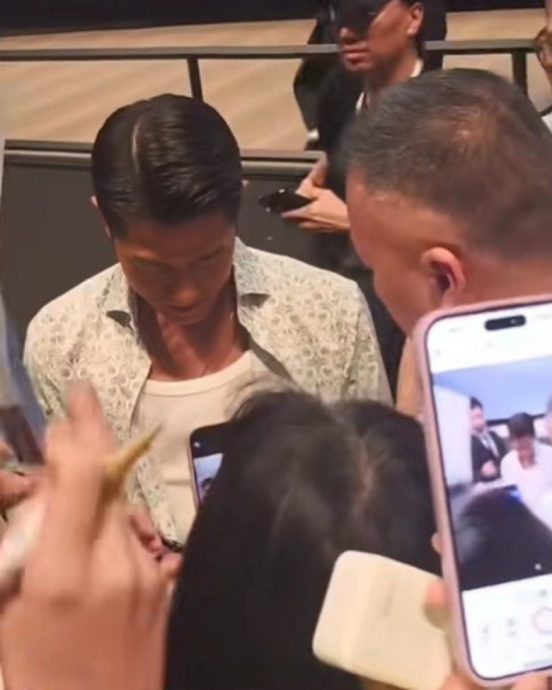 郭富城签名险被粉丝笔戳眼 1举动展现天王风范