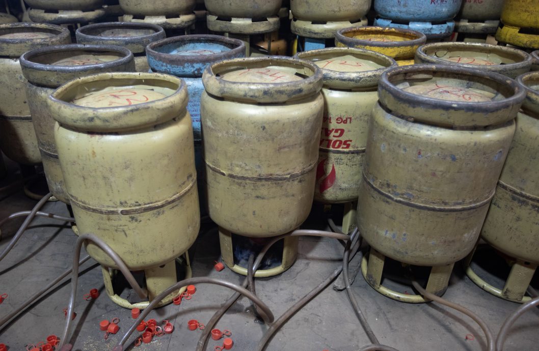 (7/8见报)星角摄/补贴液化石油气转卖黑市