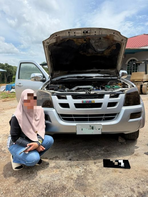 （大北马）泰女假挂大马车牌走私柴油被揭