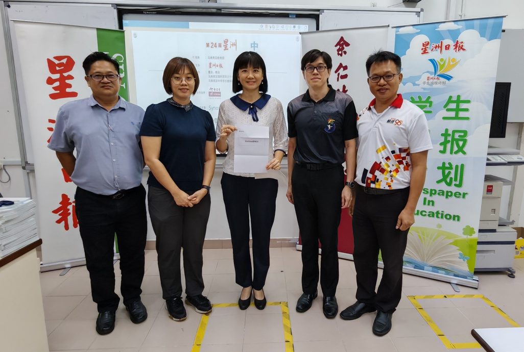 本报活动:中学生时事问答赛遇阻碍 新山站学生淡定完成作答