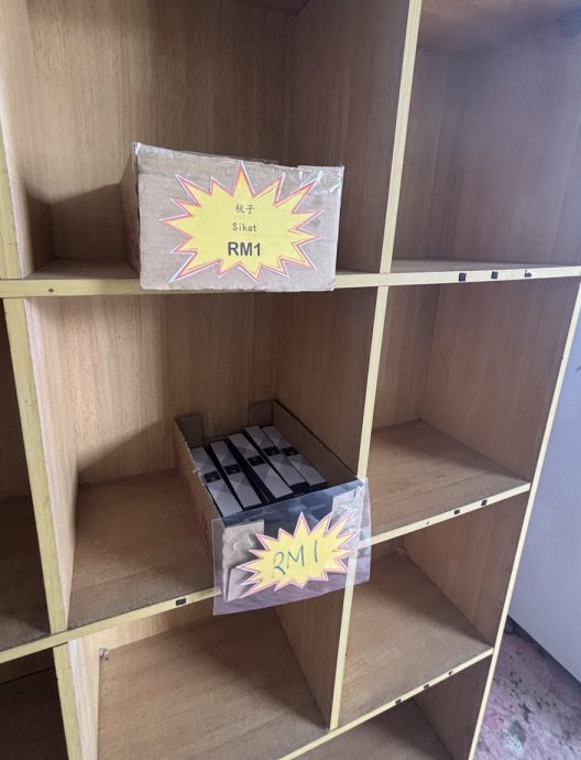 丁能爱群华小设“诚信商店”   让学生学习用钱实践道德