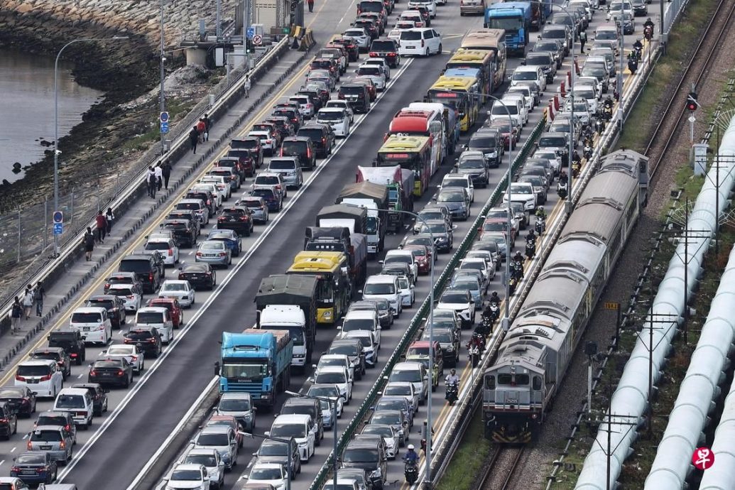 (已签发)柔:狮城二三事:6月20日逾57万人次通关 柔新陆路关卡狮城国庆日前后料拥挤