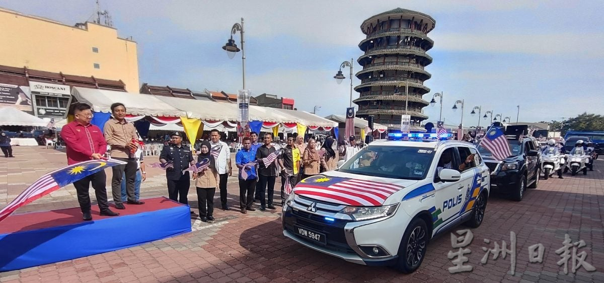 周锦欢:悬挂国旗代表爱国 象征多元国民团结