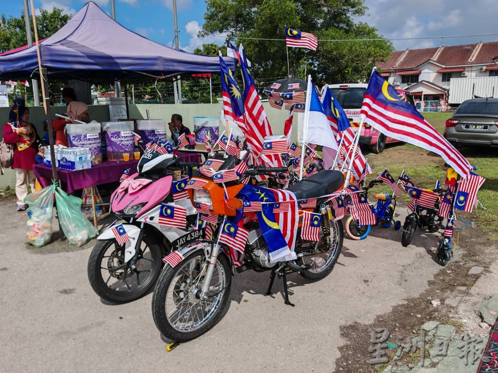 (古城版)谢守钦:要找国旗“错误”很容易,但国庆月我们挥国旗是因为发自内心为国家骄傲,有错就提醒