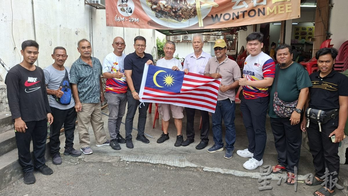 大都会／商家想挂国旗但又怕／2图