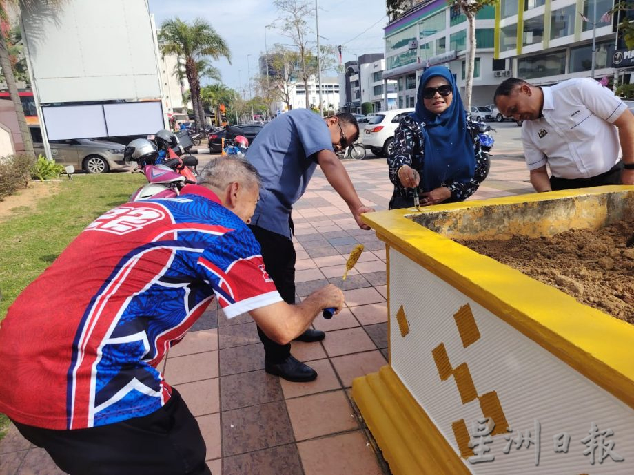 （古城第二版主文）每周二及周四动员积极清理及美化街道迎世界旅游日