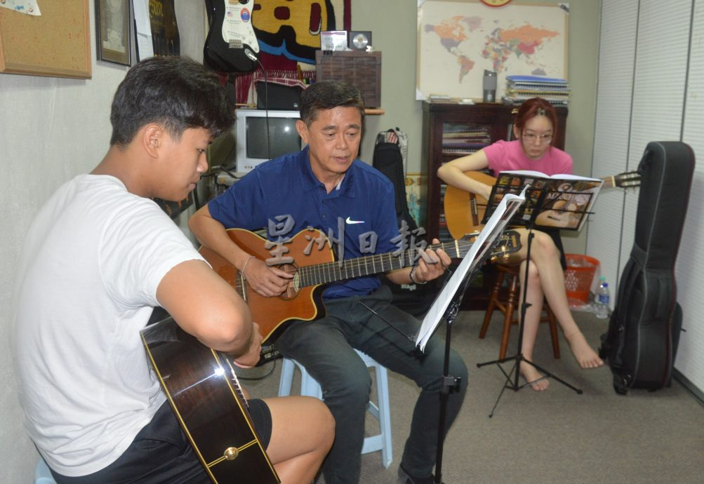 把爱好热情化为事业 温顺福 培育吉他手
