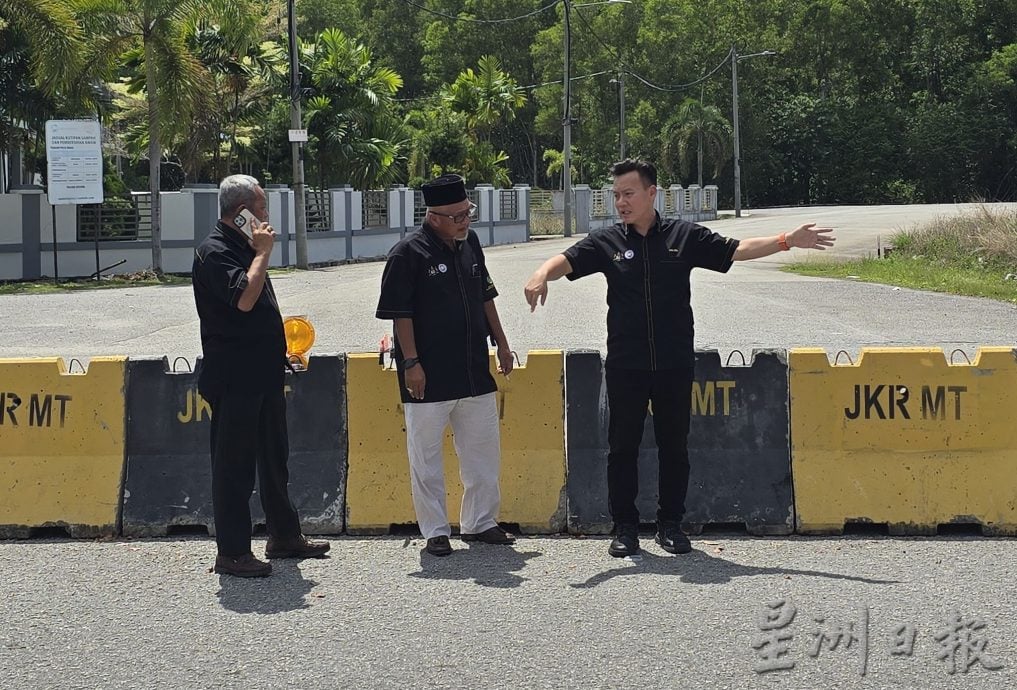 (古城第封面主文)工程局金谷镇置石墩禁非法U转减车祸不成,反给商民麻烦,生意跌20%,引反弹