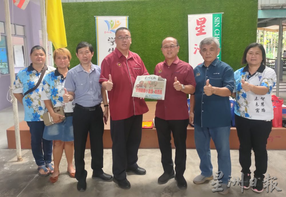 (古城第六版主文)启牖学生阅报仪式