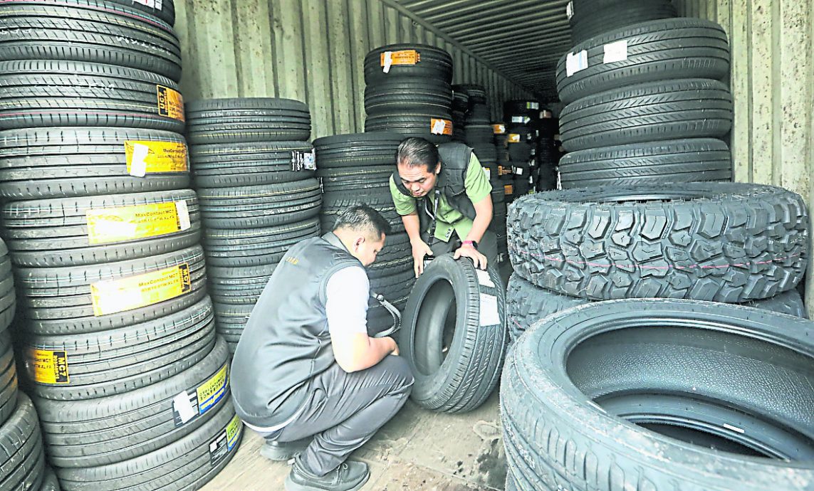 “Ops Grip”查封6仓库充公1万7672条走私轮胎 反贪会联手国际轮胎巨头鉴定轮胎真伪