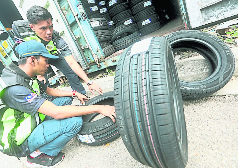 “Ops Grip”查封6仓库充公1万7672条走私轮胎 反贪会联手国际轮胎巨头鉴定轮胎真伪