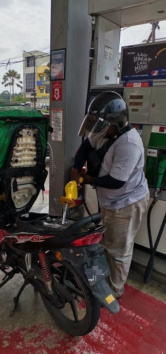 东(已签发):军警添打仁政昌明RON95汽油补贴计划开跑