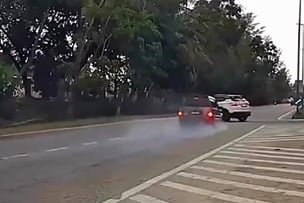 乱U转惹祸 灵鹿急刹车冒白烟