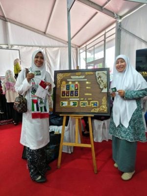 伊党大会/马哈迪肖像金币在伊党大会。