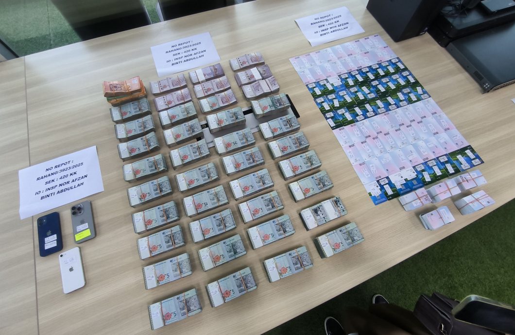 供星洲网／运输公司涉用非法充值TnG卡缴过路费　警方起获304卡与40万现金