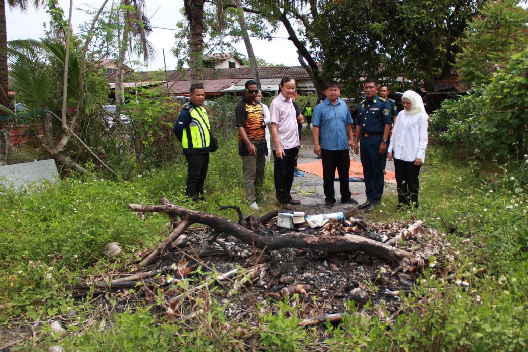 倪可汉联合执法人员 爱大华检举违法焚烧活动