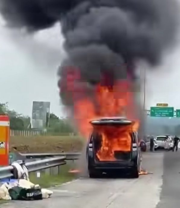 全国：（已签发)龙运国会议员旺哈山驾驶的多功能休旅车今日在第二东海岸大道起火烧毁，所幸旺哈山和妻子及时逃出车外而安然无恙。