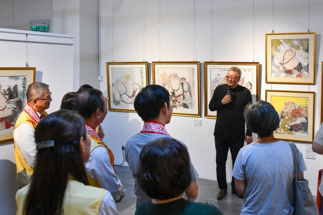 已签发 柔:版头之一:新马寺“千禧万福”弥勒画展,展出中国水墨人物画大师张智栋作品