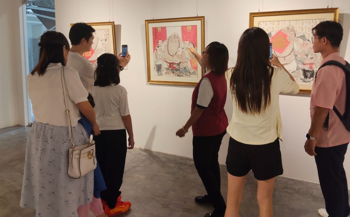 已签发 柔:版头之一:新马寺“千禧万福”弥勒画展,展出中国水墨人物画大师张智栋作品