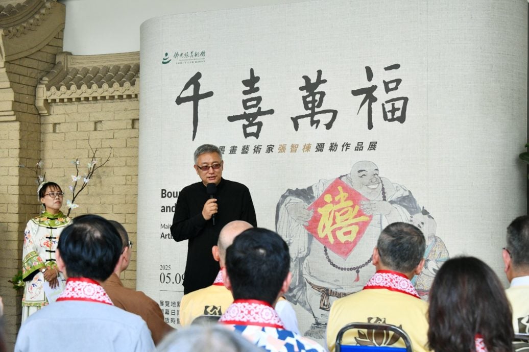 已签发 柔:版头之一:新马寺“千禧万福”弥勒画展,展出中国水墨人物画大师张智栋作品