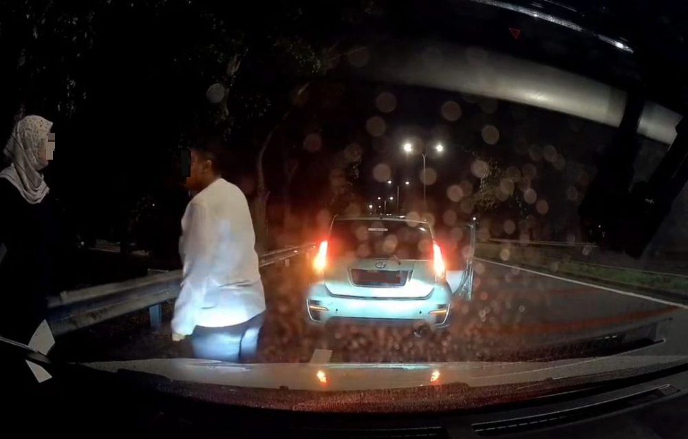 已签发//男子鲁莽驾驶抢道酿祸还作状打人·警方:已开档追查男司机下落