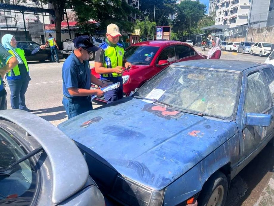 已签发(大北马)市政厅走入高楼社区 助报废汽车