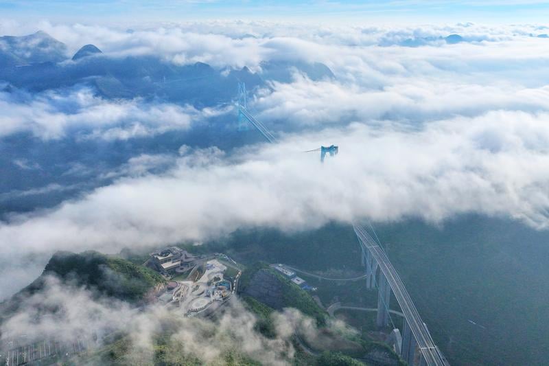 拼盘∕世界第一高桥通车 跨越“地球裂缝”2小时路程减至2分钟