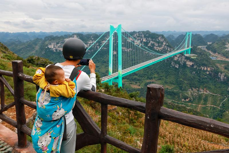 拼盘∕世界第一高桥通车 跨越“地球裂缝”2小时路程减至2分钟