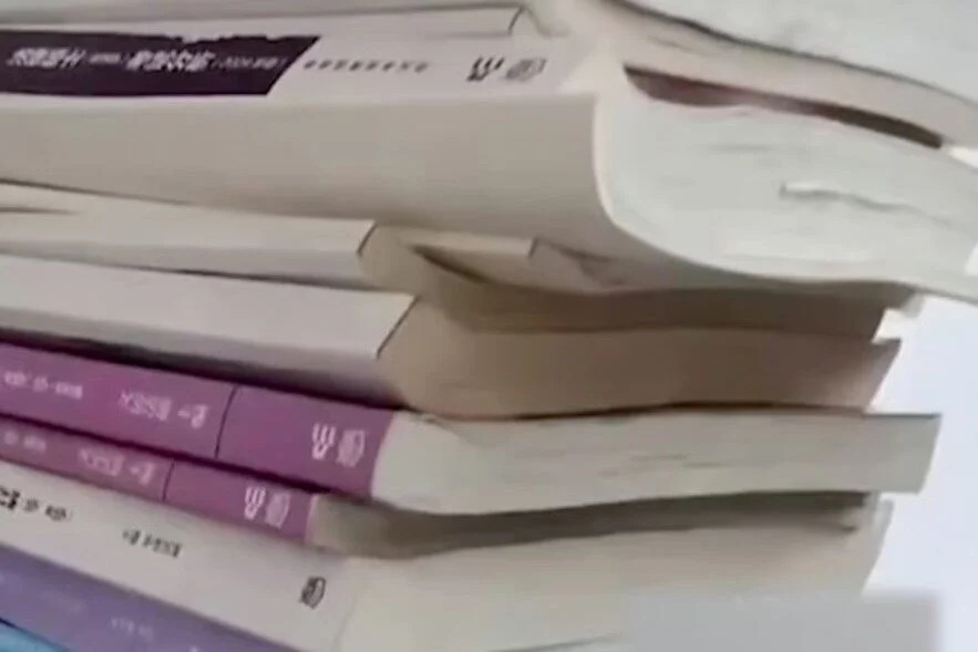 火灾毁容致残打不倒她 50岁女子自学2年考上大学