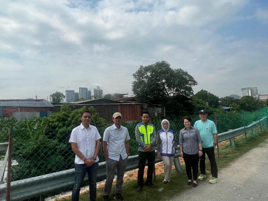 请签发-大都会/潘佩玲巡视JPS修复河堤工程／4图