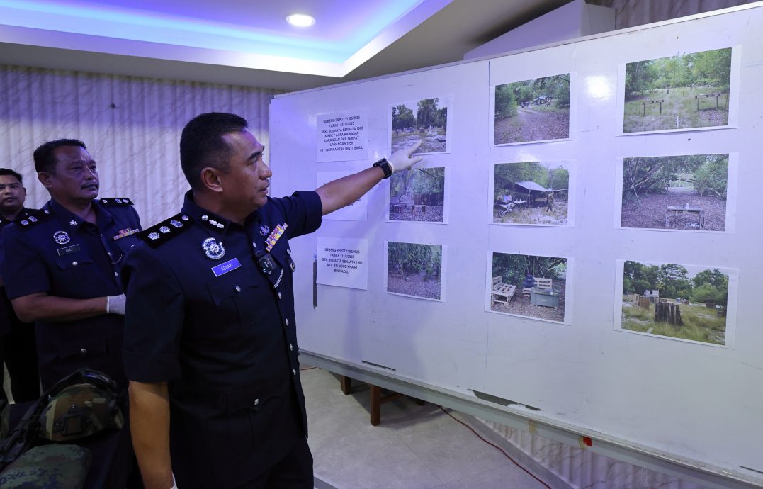 闯海军保留地玩战争游戏,警方扫荡起获价值10万令吉仿真枪捕41人。