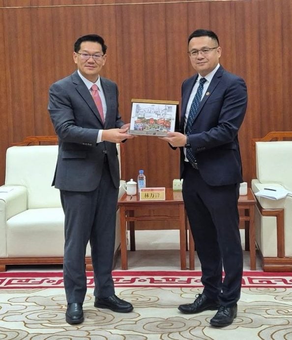 (古城版)林万锋访问访问山东大学