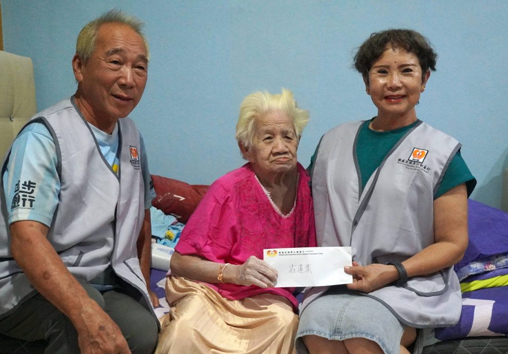 (大北马)槟威吉玻齐心积善行拨1800,助瘫痪八旬老妇