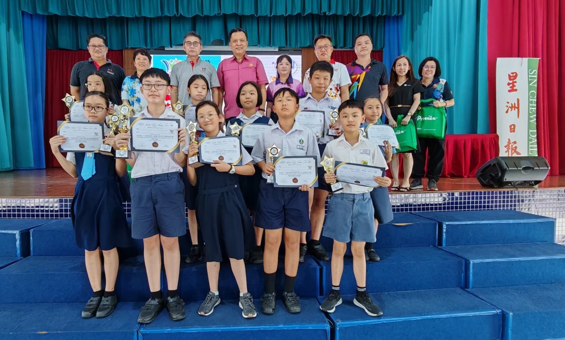 星洲“学生阅报计划”小学时事问答成绩出炉，新山国光一黄常乐与巴西古当智南廖进翔夺冠