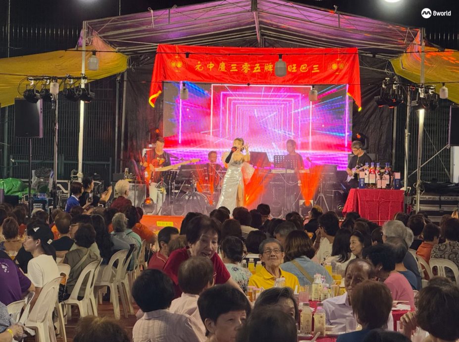 (已签发)柔:狮城二三事:庆中元活动百人中真字  月底加开歌台继续旺