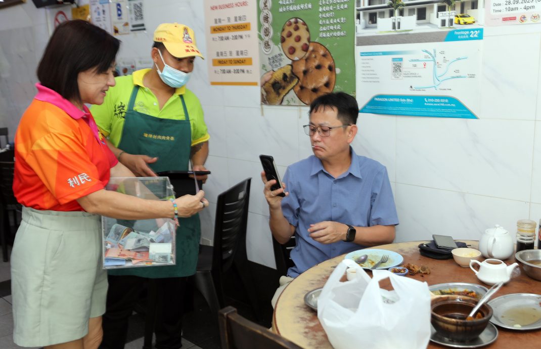 me02主文-大都会/梁德志为利民迁校争取州政府拨款/5图