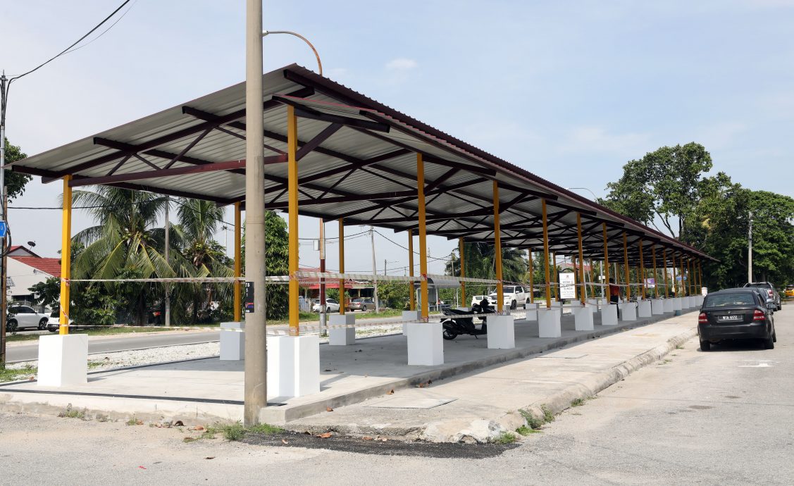 ME03主文-大都会/李锡稳巡视河边路小贩中心完工/7图