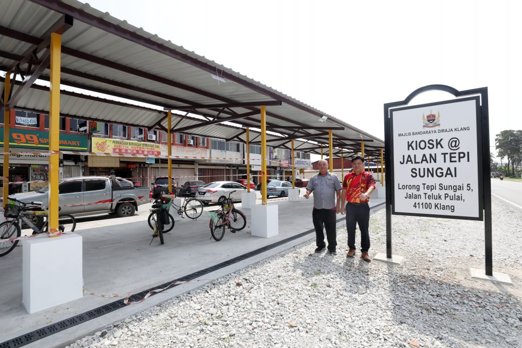 ME03主文-大都会/李锡稳巡视河边路小贩中心完工/7图