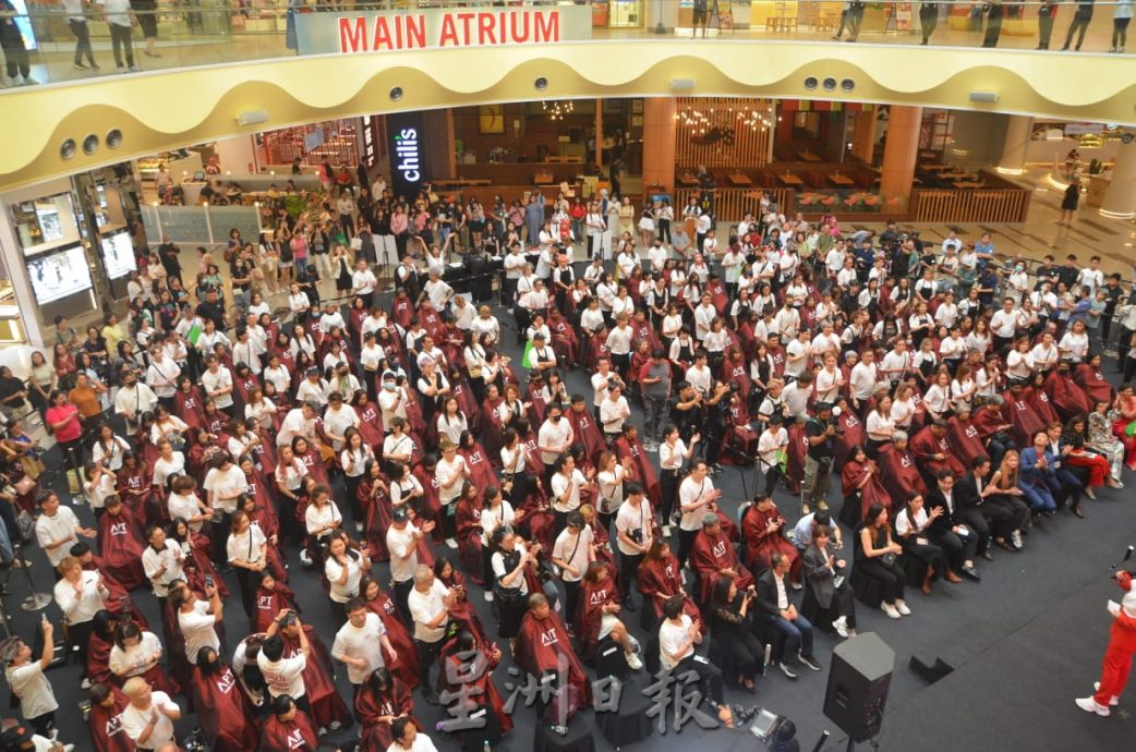 （大都会）APT慈善义剪活动 破健力士记录筹1万8400令吉／4图