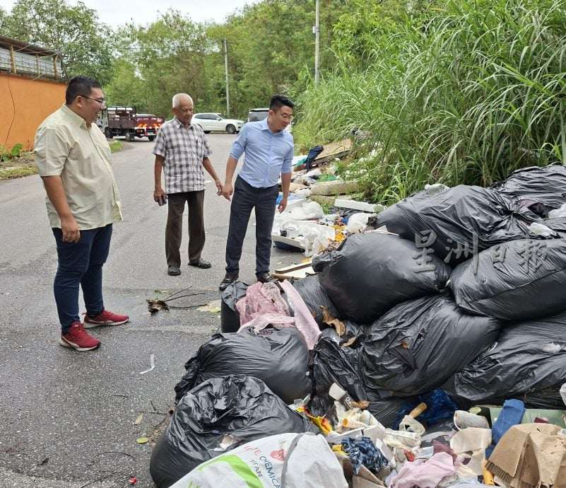 大都会3/100公尺长非法垃圾,占据马路变单向道/3图