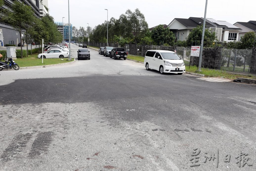 大都会/进出路口路况欠佳,发展商受指示一周内改善!