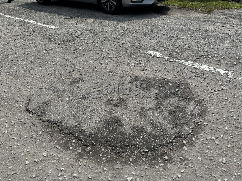 大都会/余保凭呼吁DBKL正视和改善花园马路年久失修的问题