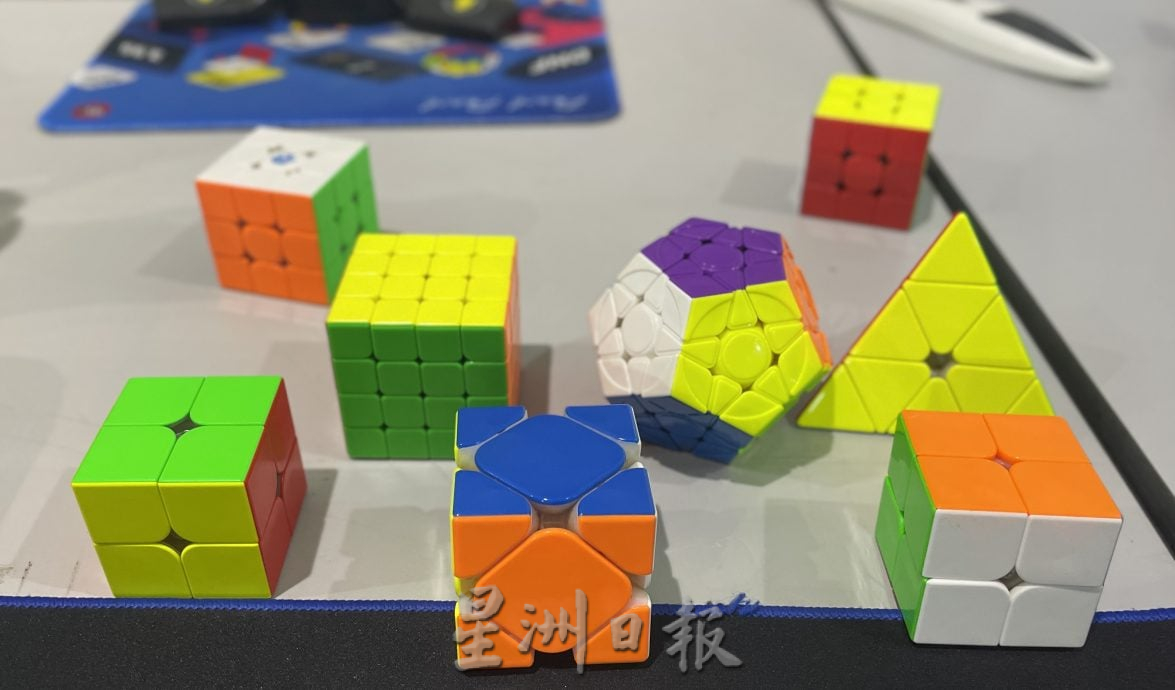 指尖飞舞秒解魔方   士姑来海南会馆青团首办魔方公开赛